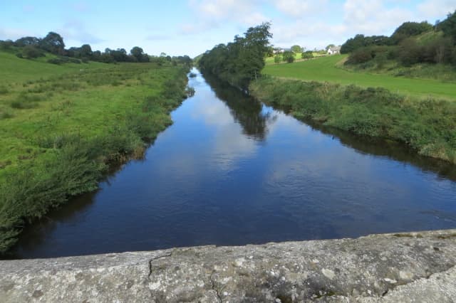 The River Bush flowing near Bushmills, County Antrim, Northern Ireland