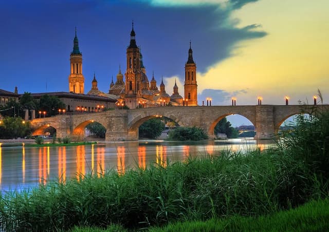 Río Ebro at Zaragoza (urban warmwater fly) — Basilica del Pilar at sunset, Zaragoza