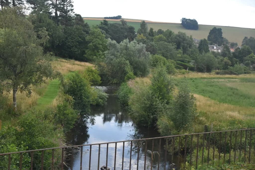 The River Eden flowing through farmland in Fife, Scotland