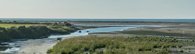 The Hokitika River mouth flowing into the Tasman Sea on New Zealand's West Coast