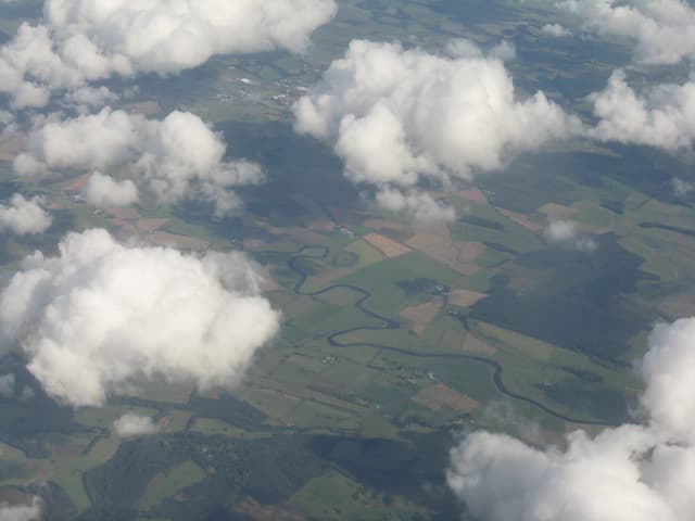 The River Annan flowing through open Annandale countryside southwest of Lockerbie in late-summer low water.
