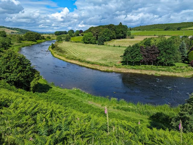 Aerial view of the River Don winding through farmland near Dyce, Aberdeenshire