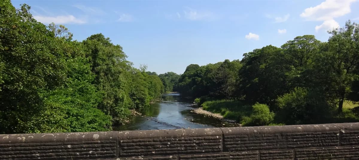 The River Hodder flowing beneath Hodder Bridge near Hurst Green, Lancashire, in the Forest of Bowland.