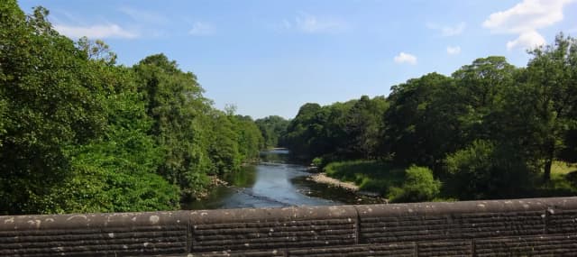 The River Hodder flowing beneath Hodder Bridge near Hurst Green, Lancashire, in the Forest of Bowland.
