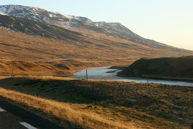 The Blanda river flowing beneath Langadalsfjall mountain in the upper valley, north Iceland.