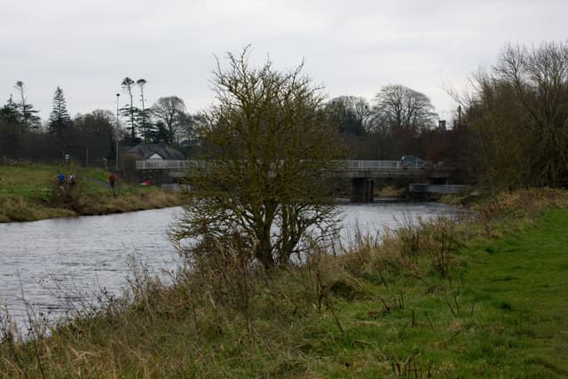 The River Boyne flowing broad and calm through Trim, County Meath, on a winter morning.