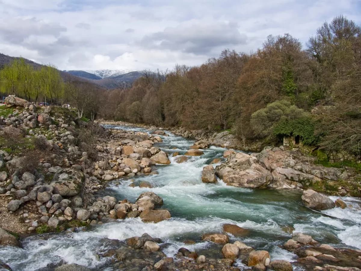Boulder-strewn mountain stream, Garganta de Cuartos, running through La Vera, Cáceres, Spain