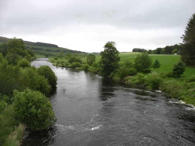 The River Deveron flowing past the village of Milltown of Rothiemay in Moray, Scotland.