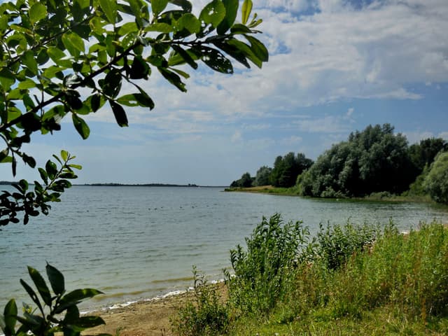 Landscape photograph of Draycote Water reservoir showing open water and surrounding countryside.