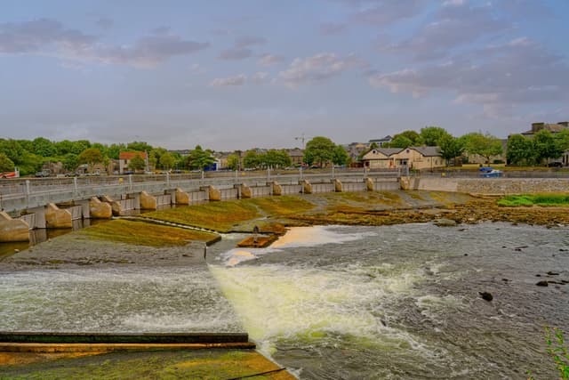 The Galway Salmon Weir on the River Corrib in summer.