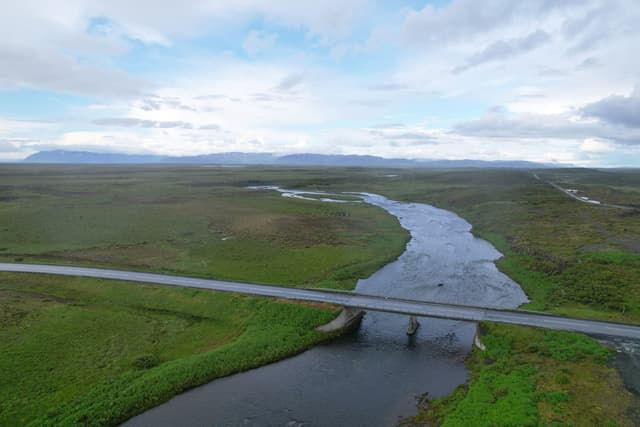Aerial view of the Langá river near the Road 54 bridge, west Iceland.