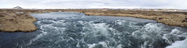 Wide panorama of the Laxá river at the Road 848 bridge near Reykjahlíð, Mývatn, north Iceland.