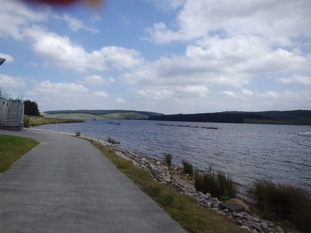 Upland reservoir landscape at Llyn Brenig showing open water amid moorland under a wide sky.