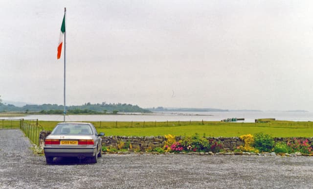 Lough Corrib seen from the shore at Oughterard, open water extending to the far bank.