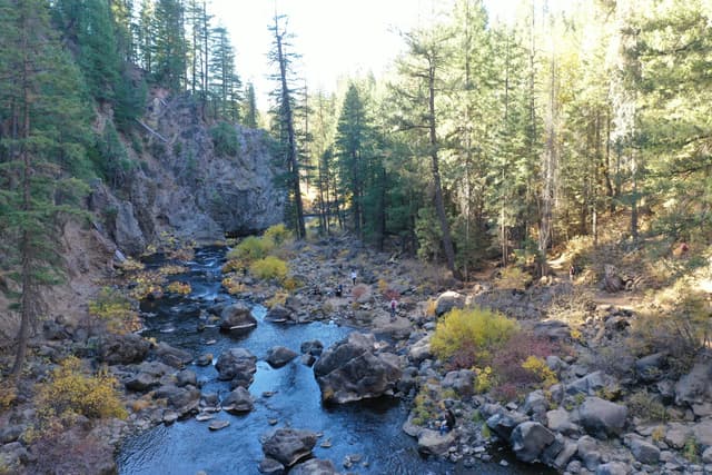 The McCloud River flowing over volcanic rocks below Middle Falls, Shasta County, California.