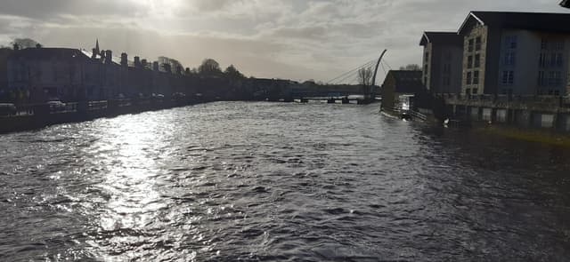 Wide panoramic view of the River Moy flowing through Ballina, County Mayo.