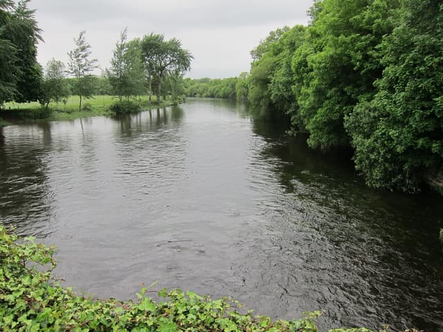 The River Blackwater in spate after rain, viewed from Roskeen Bridge, County Cork.