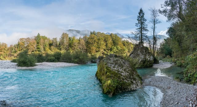 Wide view of the emerald Soča river near Kamno in the Kobarid municipality, Slovenia.