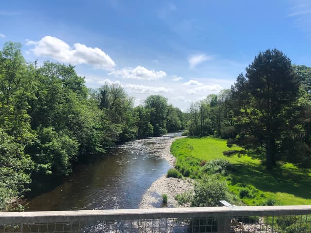 The River Towy running through Llandovery, Carmarthenshire, with the valley beyond.